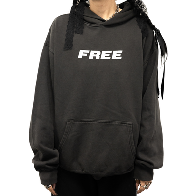 Black faded hoodie with white 'FREE' text on front, front pocket, relaxed fit