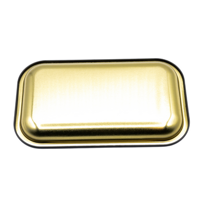 Rectangular gold metal rolling tray with rounded edges on white background
